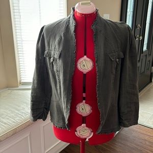 Waist length linen jacket with 3/4” sleeves, soft ruffles, clasp front closure.